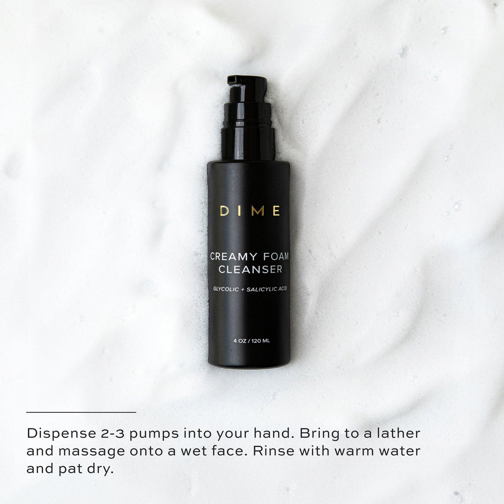 DIME Creamy Foam Cleanser box and bottle shown on tidy vanity.