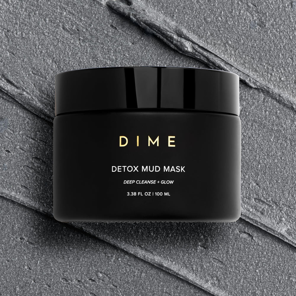 DIME Beauty Detox Mud Mask spatula application on skin for refreshing cleansing.