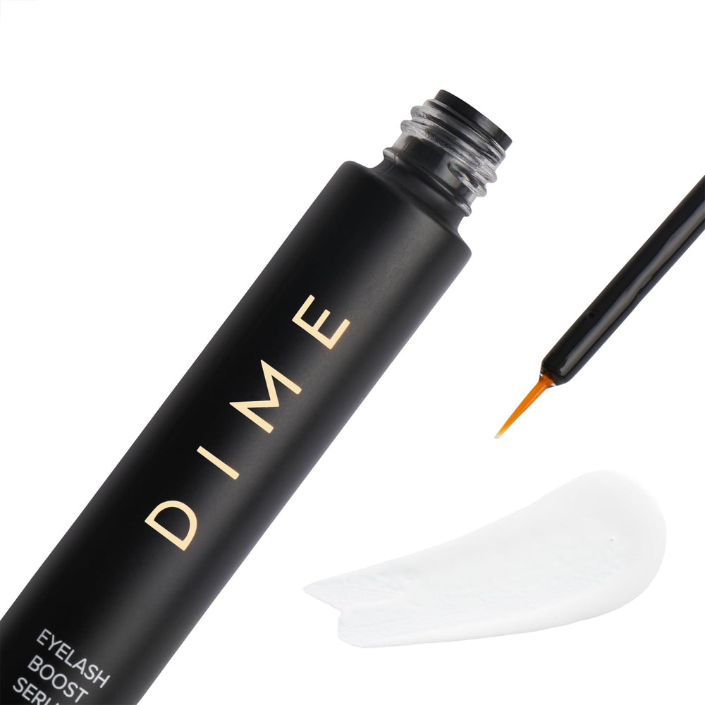DIME Beauty serum dropper applying precise amount to lashes.