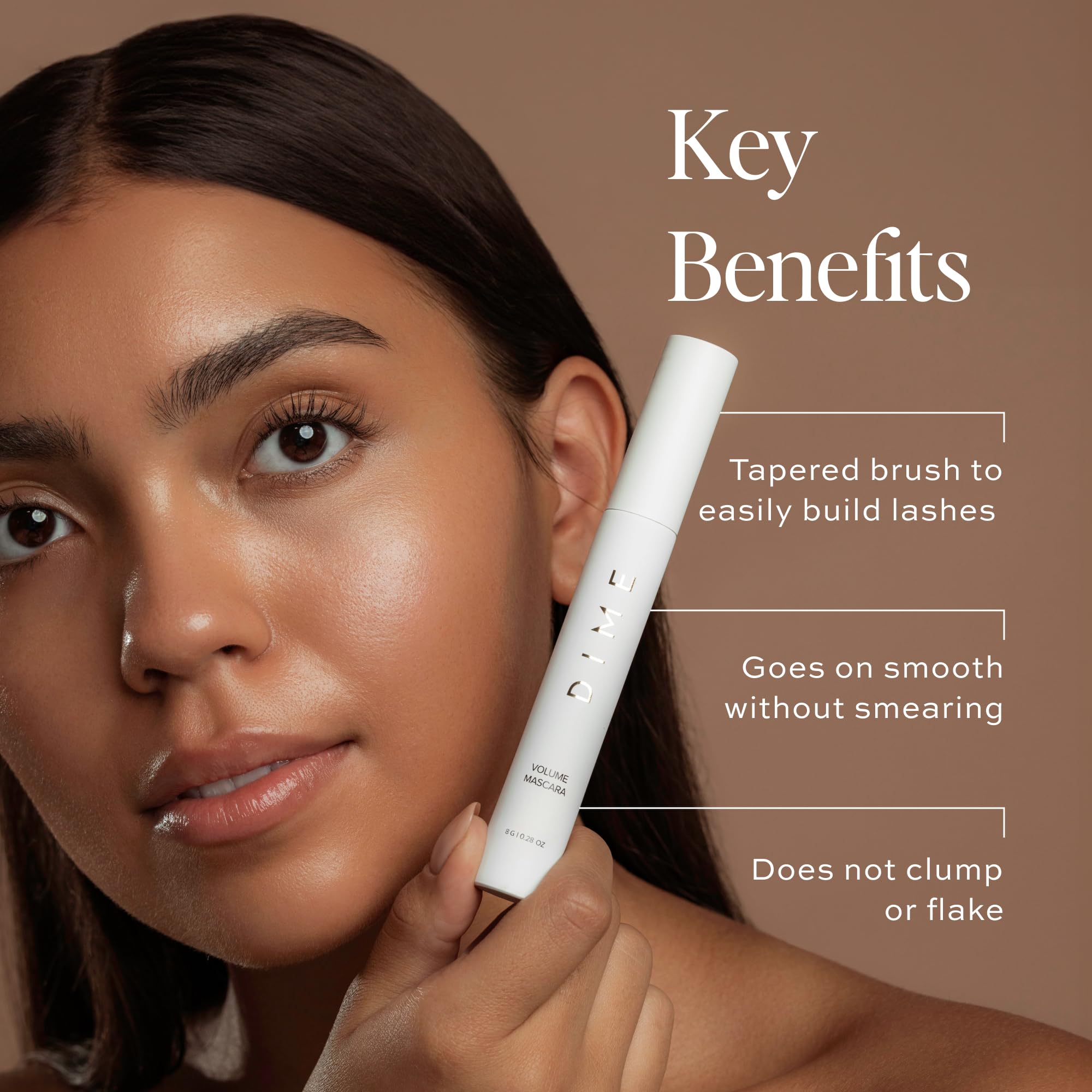 DIME Beauty Volume Mascara wand close-up emphasizes tapered brush for easy application.