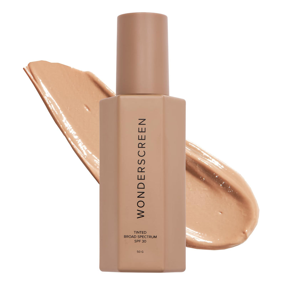 DIME Wonderscreen SPF 30 bottle close-up shows mineral sunscreen texture for daily protection