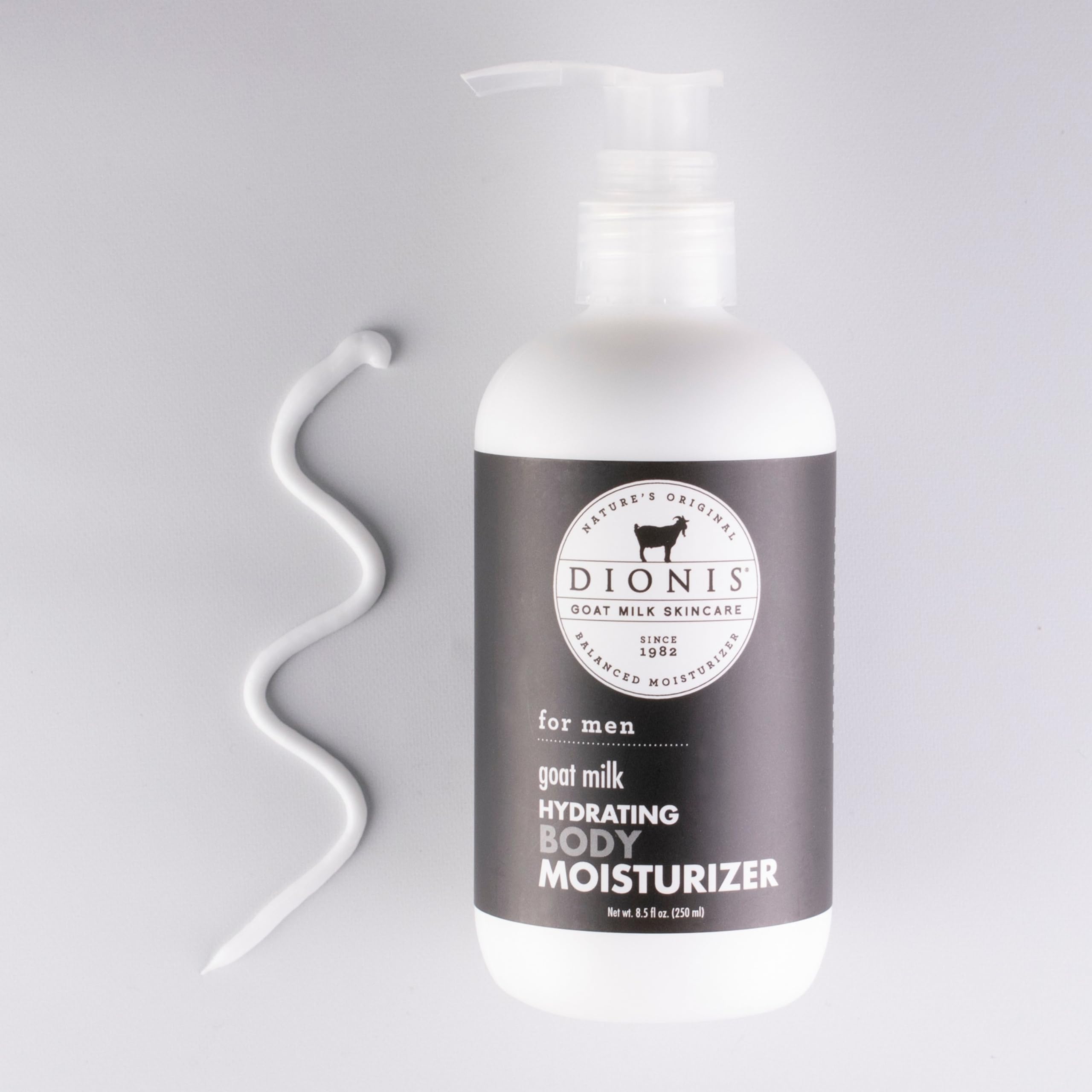 Label close-up on Dionis goat milk lotion highlighting masculine fragrance.
