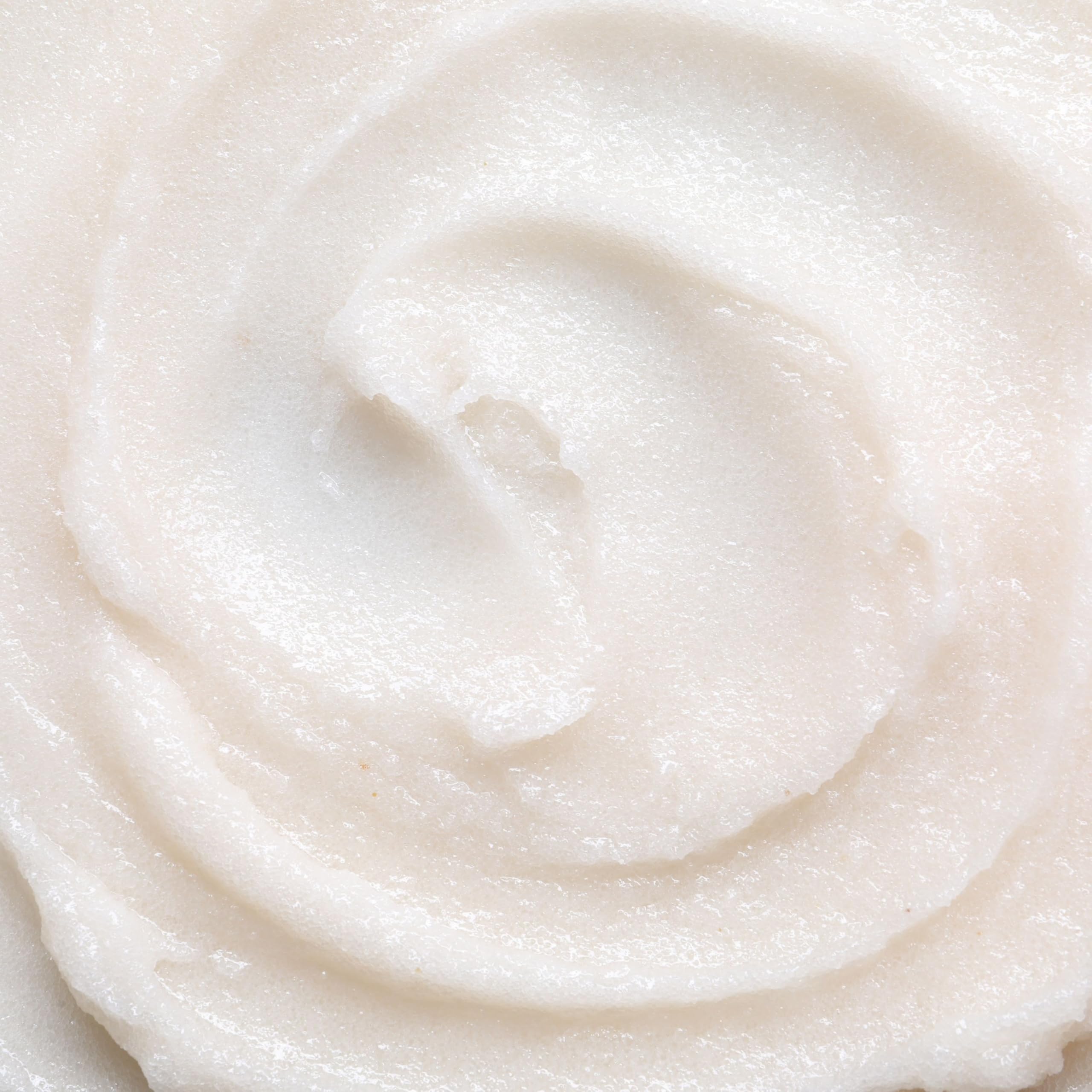 Dionis Goat Milk Whipped Scrub jar application shot highlights gentle exfoliation