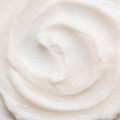 Dionis Goat Milk Whipped Scrub jar application shot highlights gentle exfoliation