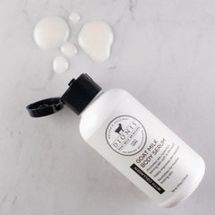 Dionis serum applied to arm for hydration and smoothness.