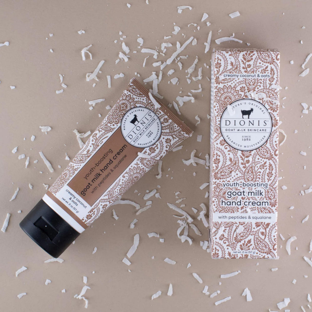 Dionis Youth Boosting Goat Milk Hand Cream tube front emphasizes travel-friendly packaging