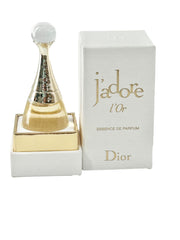 Dior J'adore Essence L'Or mini bottle pour travel-ready elegance and floral notes.