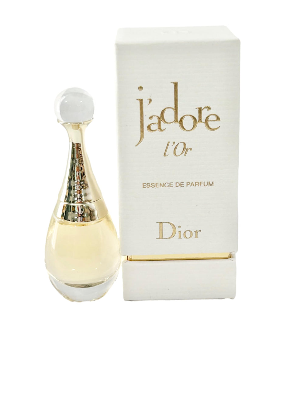 Dior J'adore Essence L'Or travel-size spray for quick touch-ups with lasting aroma.