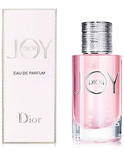 Dior Joy bottle detail highlighting creamy woods and musks for softness.