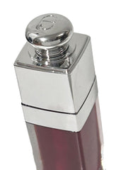 Dior Lip Glow Oil Color Reviver 062 Cherry Oil swatch shows luminous color and moisture.