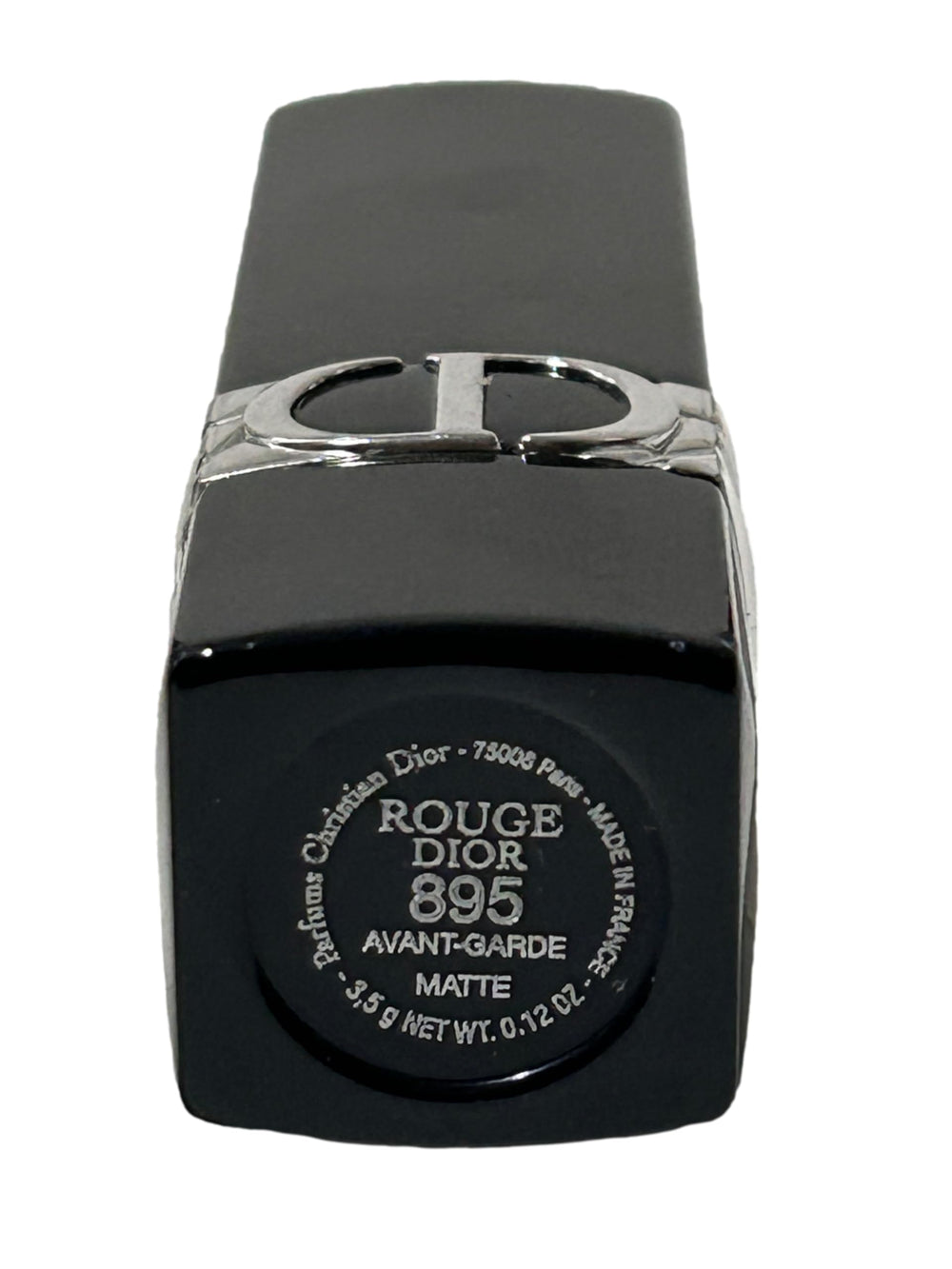 Dior Rouge Lipstick Avant Garde Matte swatches reveal rich pigment on lips.