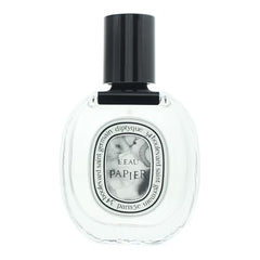 Close-up of Diptyque L'Eau Papier cap, elegant design for on-the-go