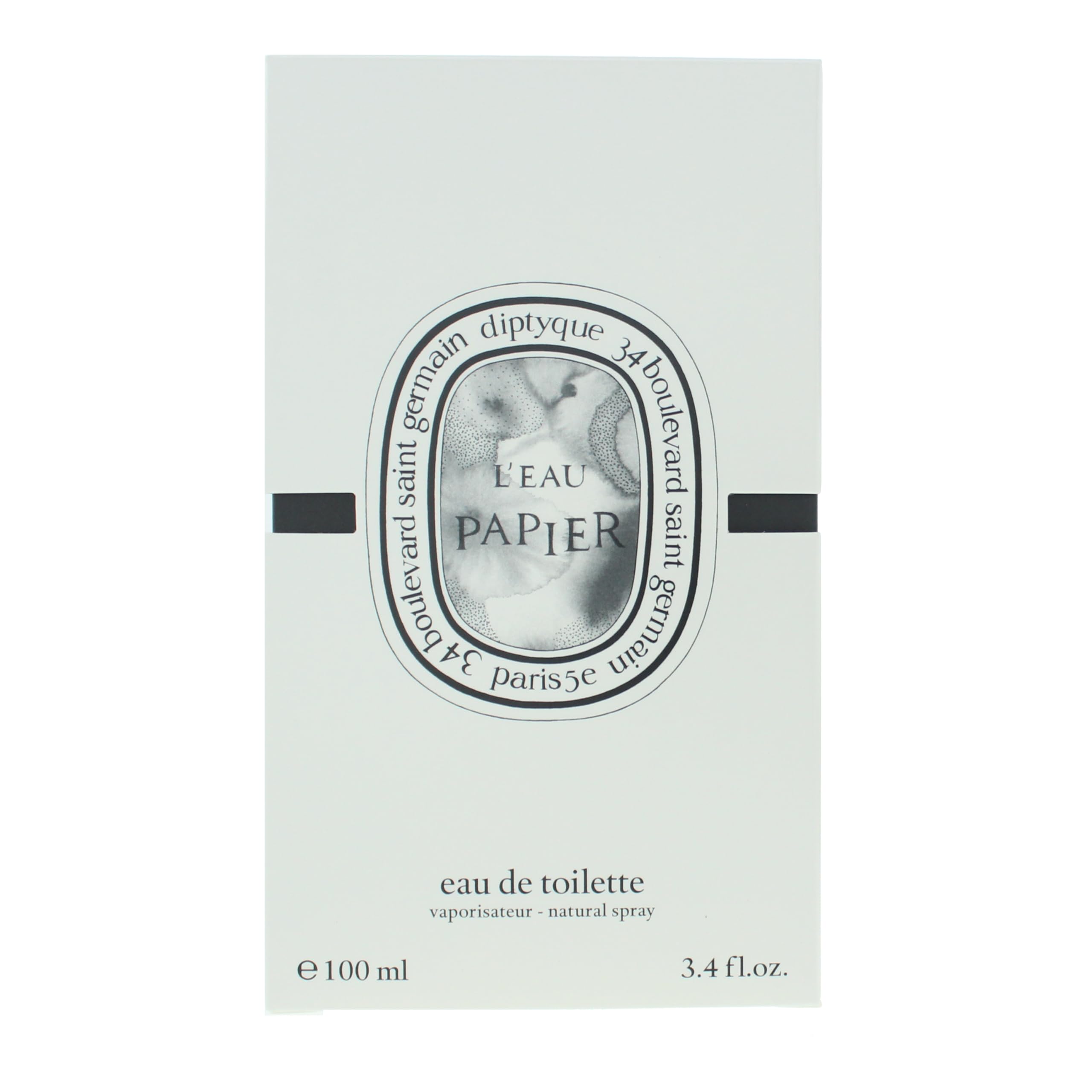 Diptyque L'eau Papier worn on skin to evoke daily ritual and freshness.