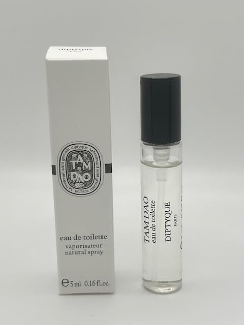 Diptyque Tam Dao mini bottle, travel-friendly woody scent for men and women.