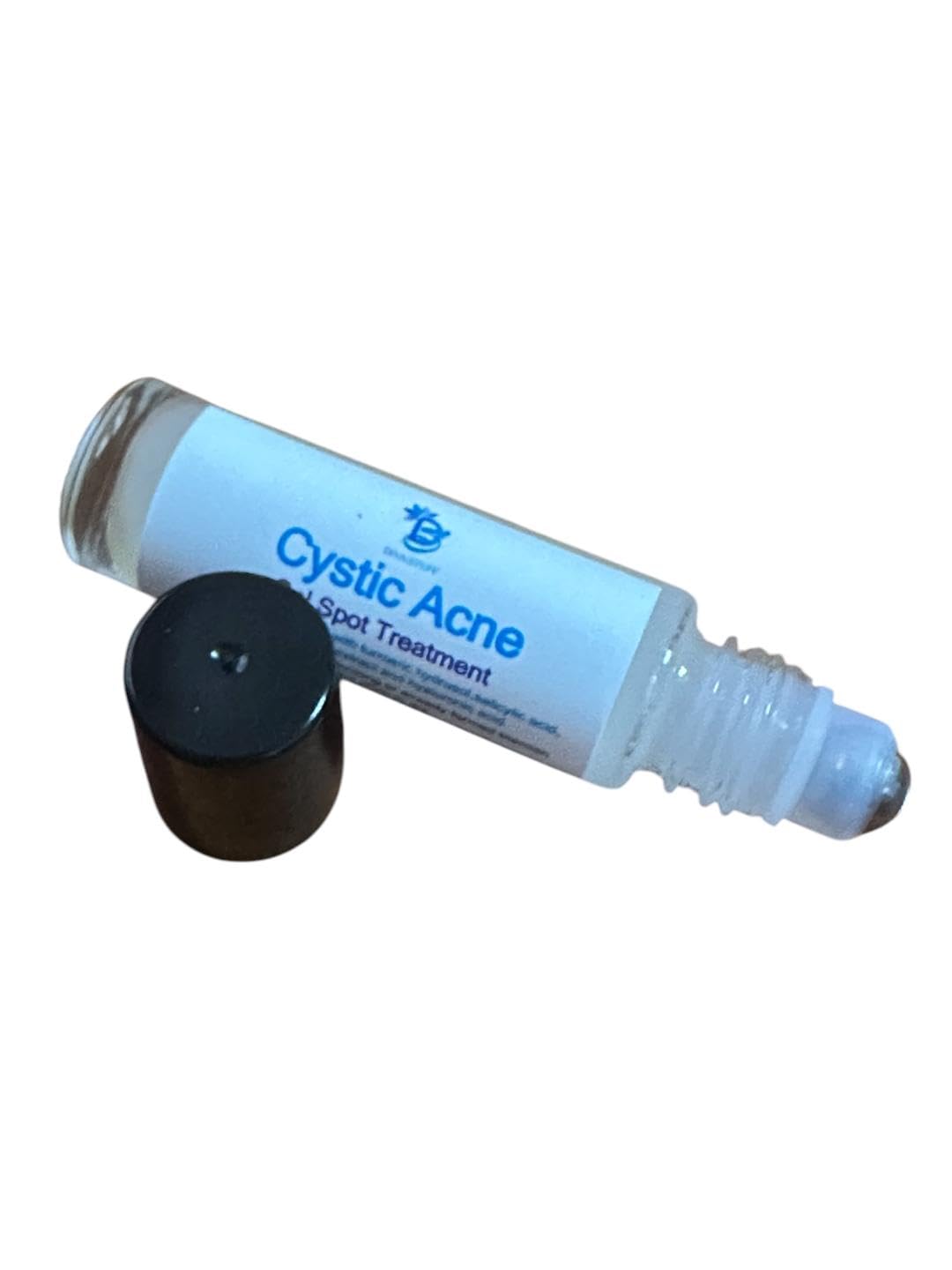 Diva Stuff rollerball serum application being applied on skin for makeup-friendly use.