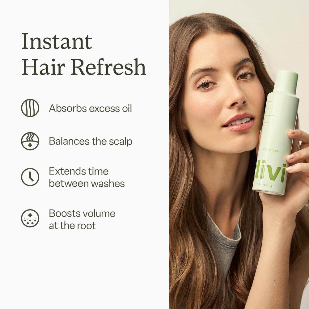 Divi Dry Shampoo application spray targets roots for oil absorption.
