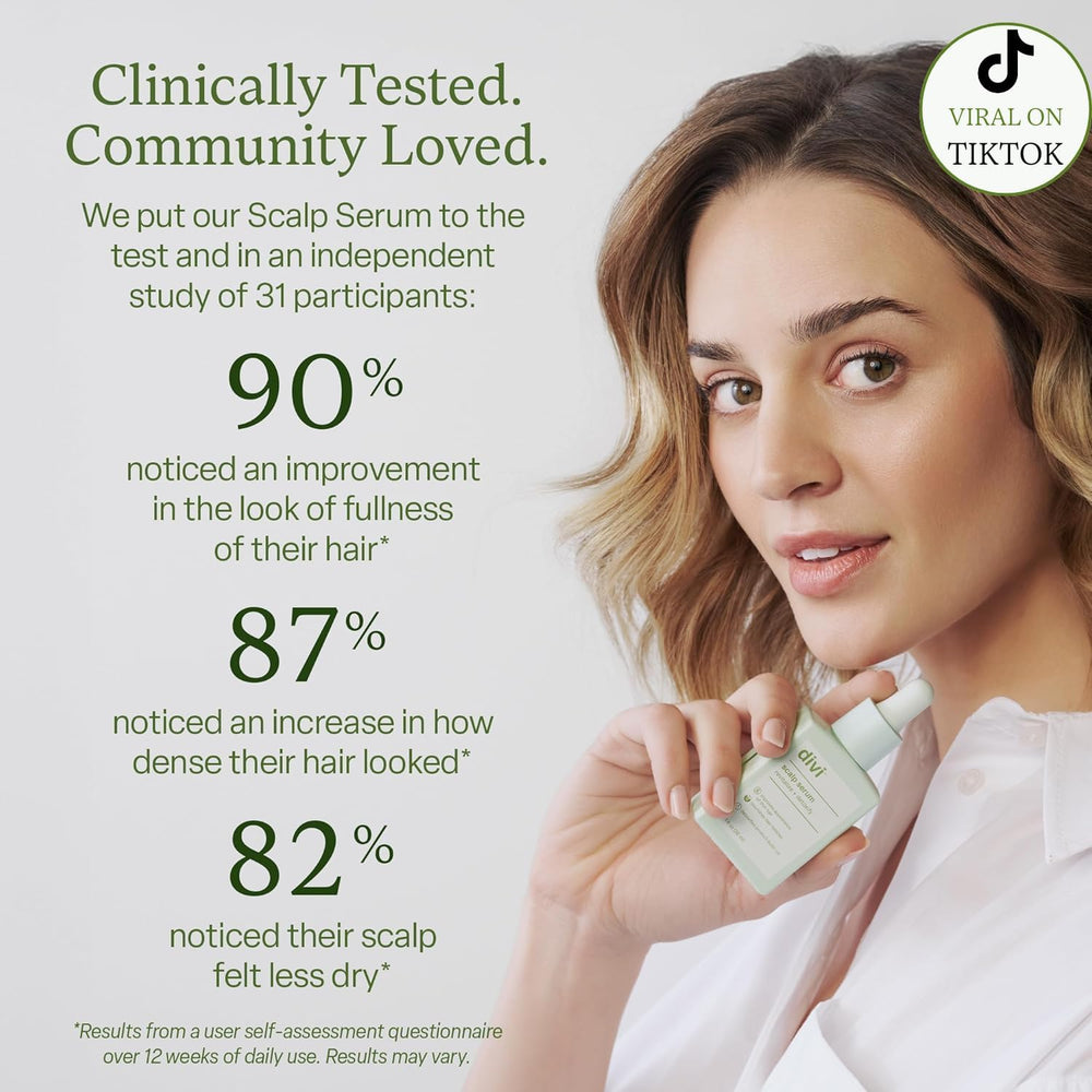 Divi Scalp Serum on the scalp for targeted nourishment.