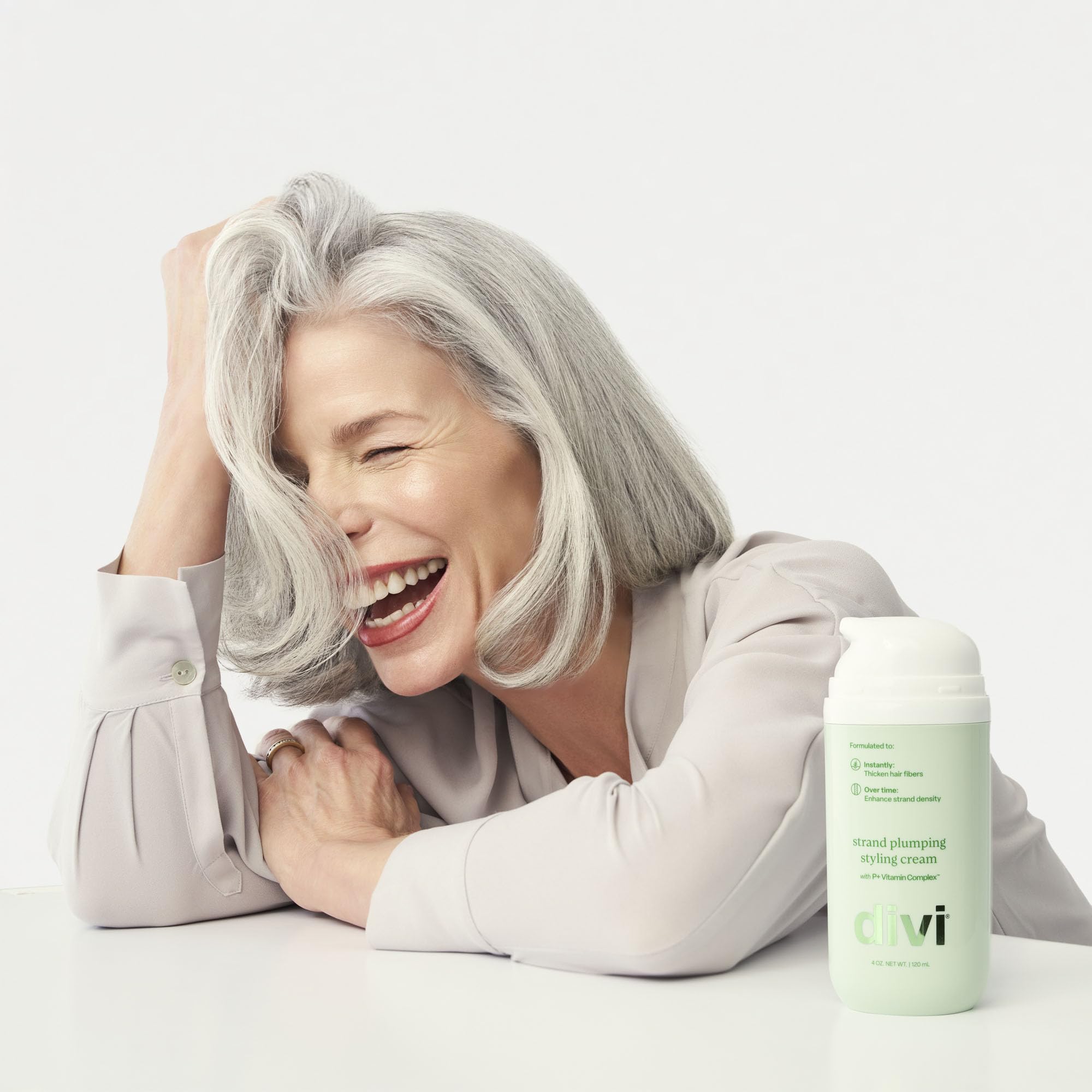 Divi Strand Styling Cream during blow-drying shows heat protection and volume boost.