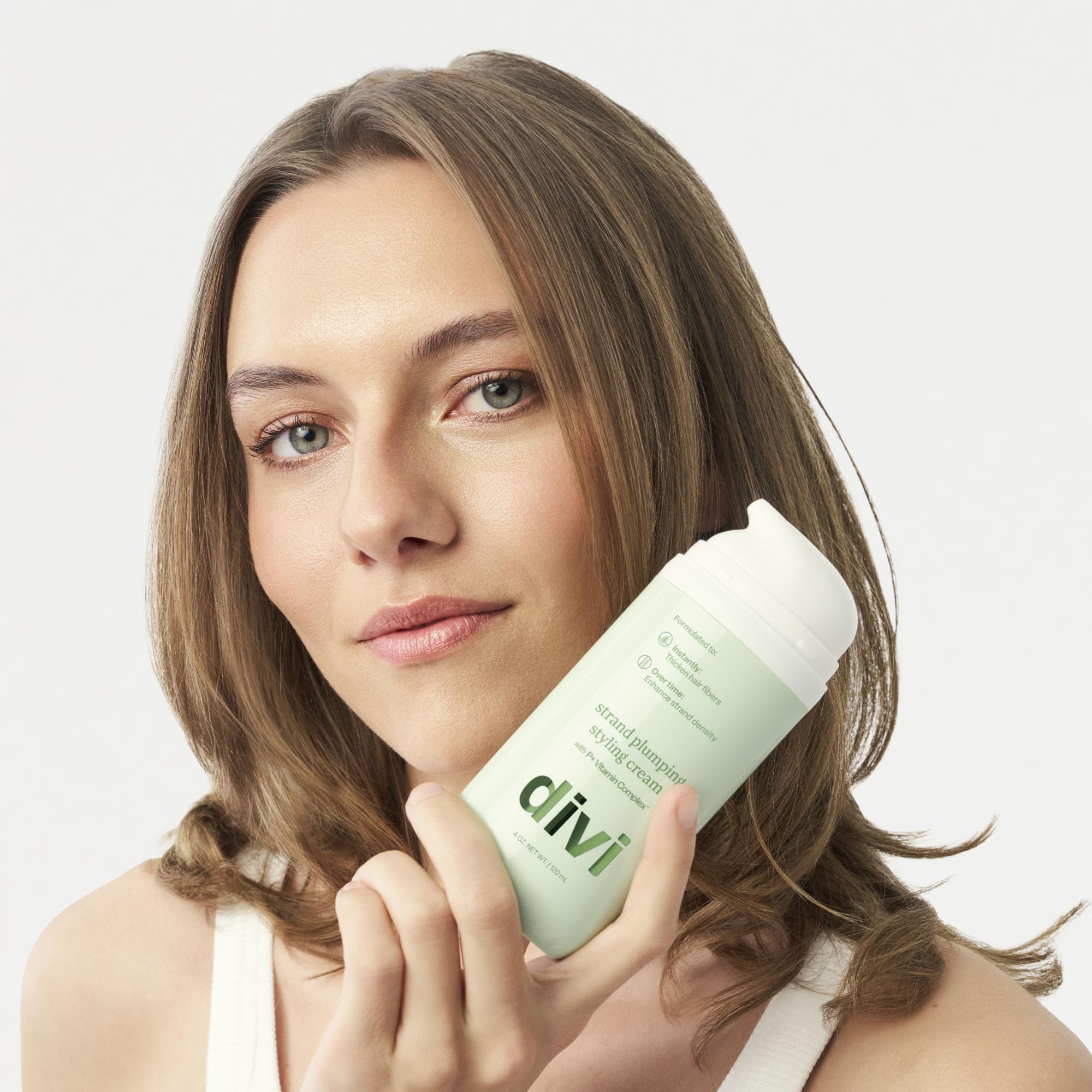 Divi Strand Styling Cream model hairstyle demonstrates longer-term fullness potential.