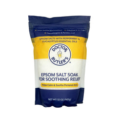 Doctor Butler's epsom salt soak bottle being poured for soothing relief.