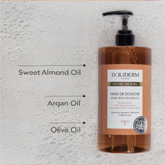 Doliderm Paris Argon, sweet almond, and olive oils blend shown on skin for nourishment.