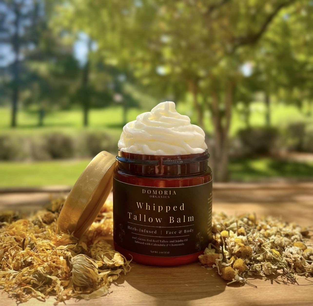 Domoria Organics tallow balm texture melting on skin for easy hydration