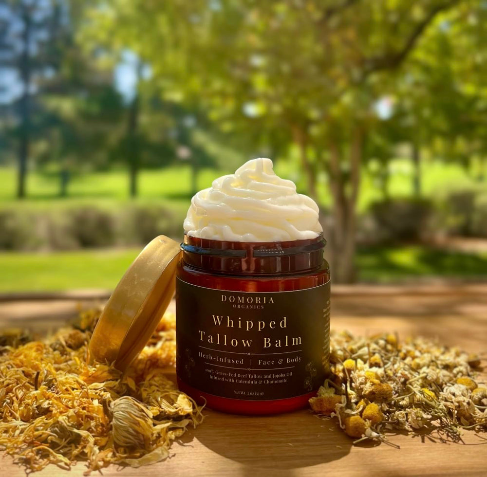 Domoria Organics tallow balm texture melting on skin for easy hydration