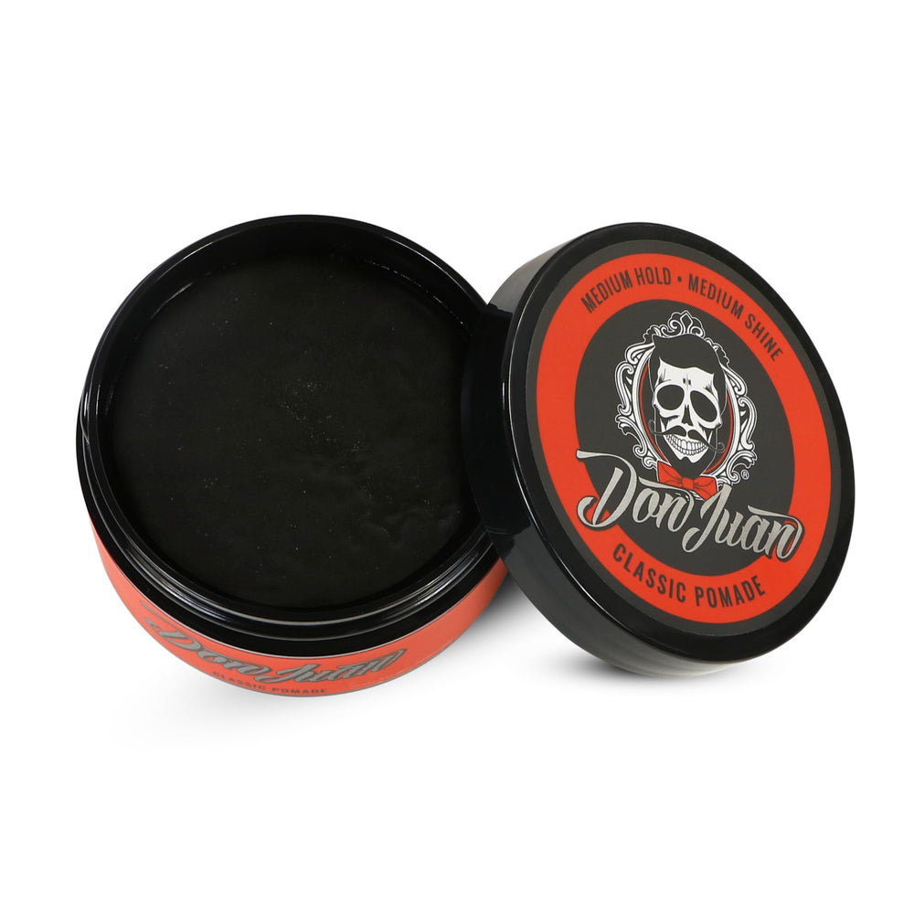 Don Juan Pomade hands applying product for quick restyling