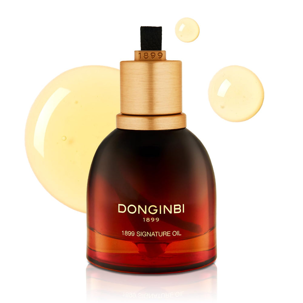 Donginbi 1899 Signature Oil bottle close-up for premium anti-aging support.