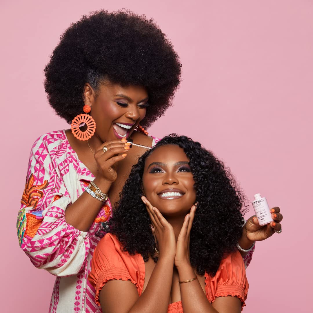 Donna's Recipe Strength Hair Oil scalp massage scene conveys soothing, refreshing care.