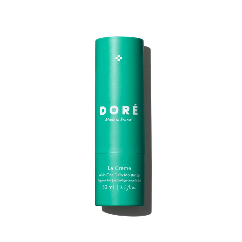 Doré La Crème bottle pour shows hydration ready for daily skincare routine.