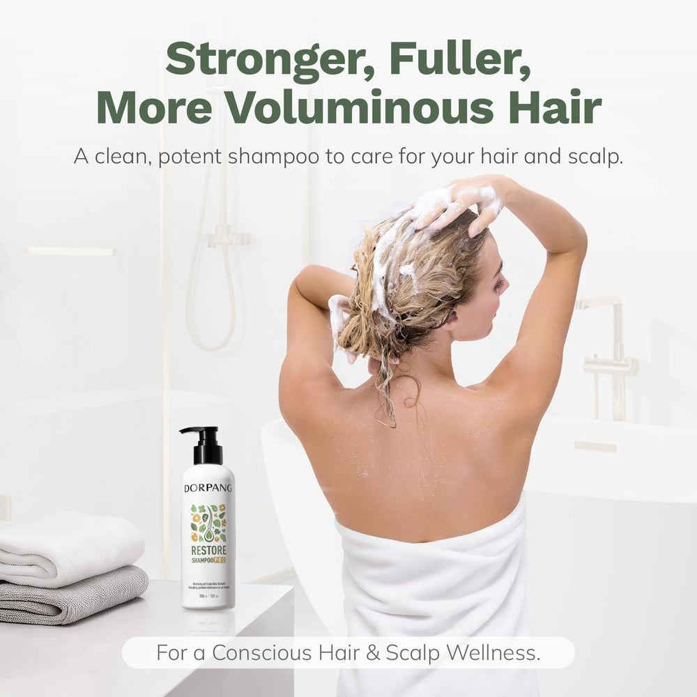 DORPANG Restore Shampoo label close-up featuring AnaGain™ and actives for scalp balance.