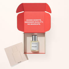 Dossier brand logo signaling timeless luxury and fragrance heritage.