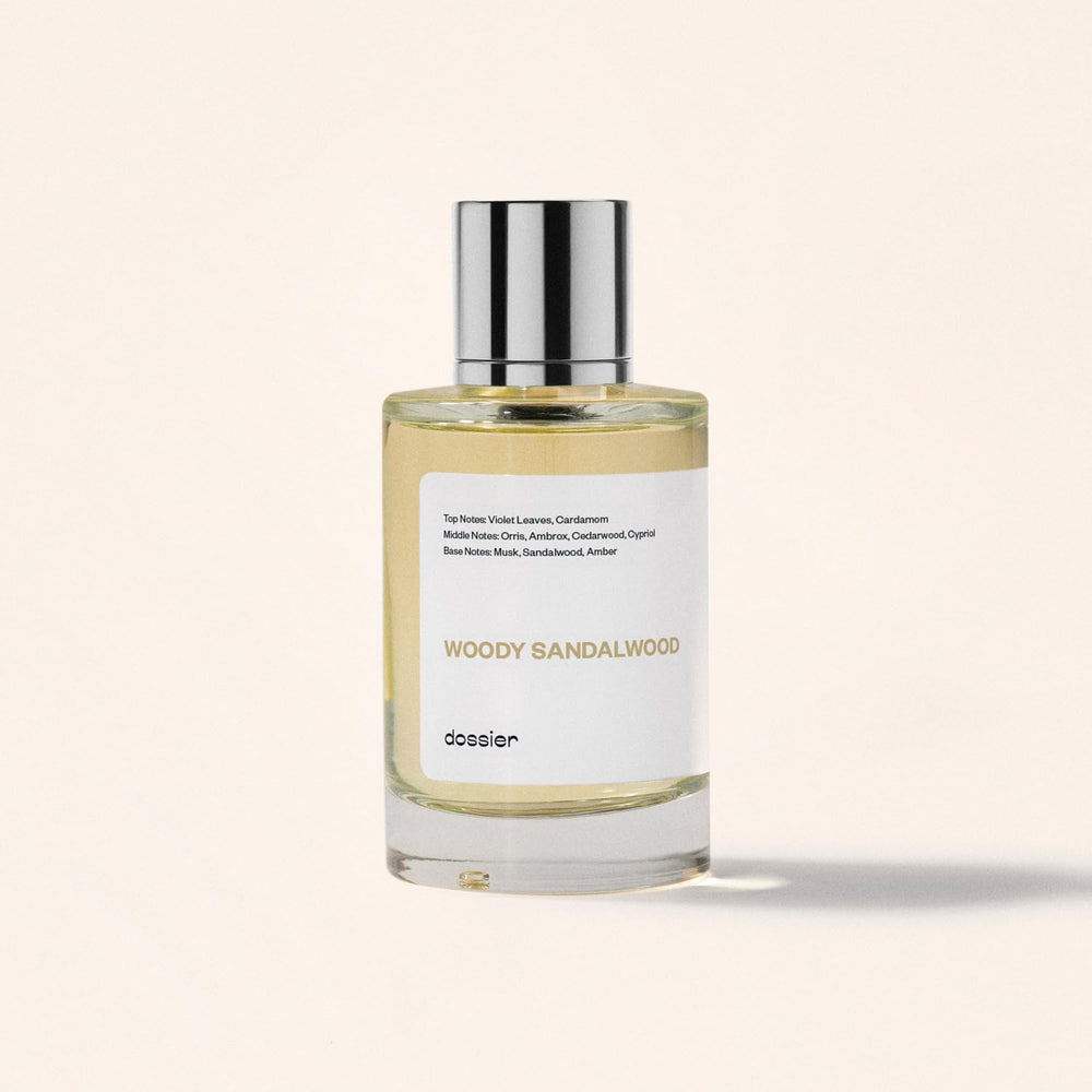 Dossier Woody Sandalwood spill shot evokes warm sandalwood notes