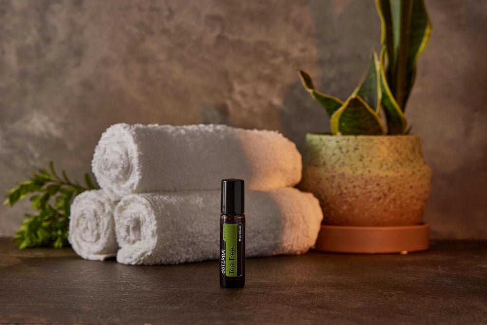 doTERRA Melaleuca Touch roll-on application on skin