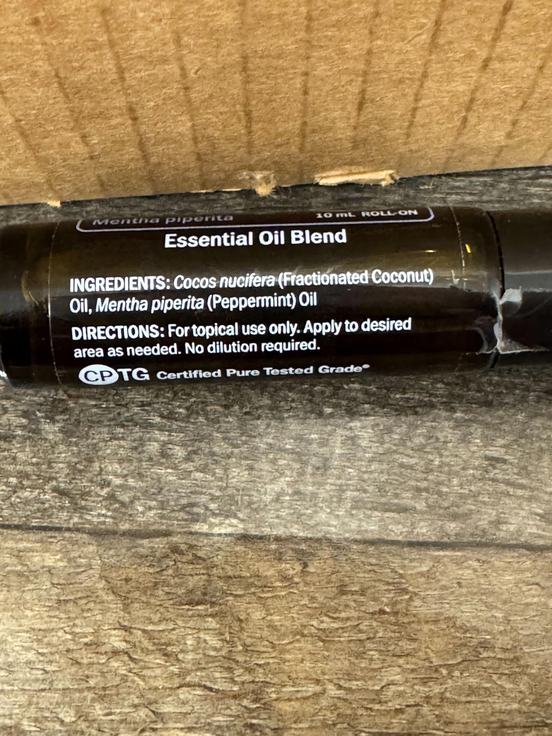 doTERRA Peppermint Touch cap close-up highlighting travel-friendly design