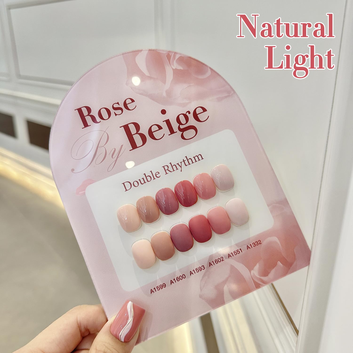 Double Rhythm at-home manicure setup featuring rose-beige polish collection.