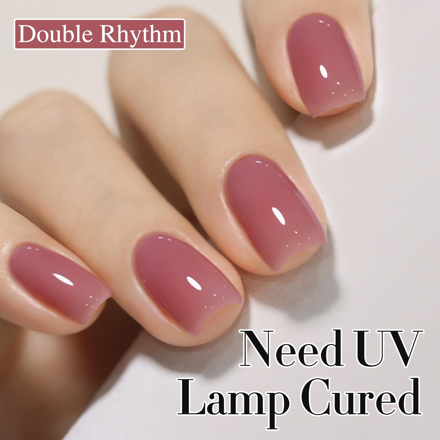 Double Rhythm at-home nail art setup with polishes and tools for DIY nails.
