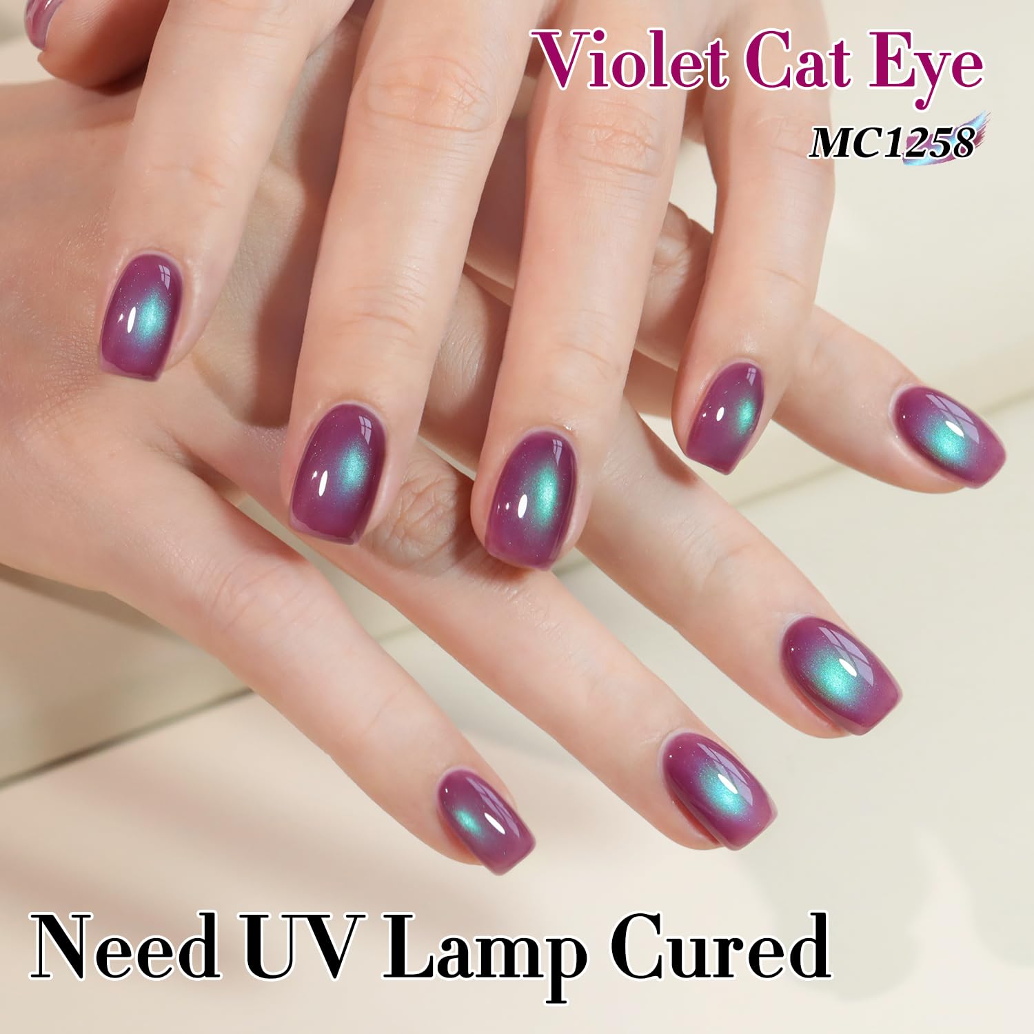 Shimmering holographic finish from Double Rhythm cat eye gel polish adds flare.