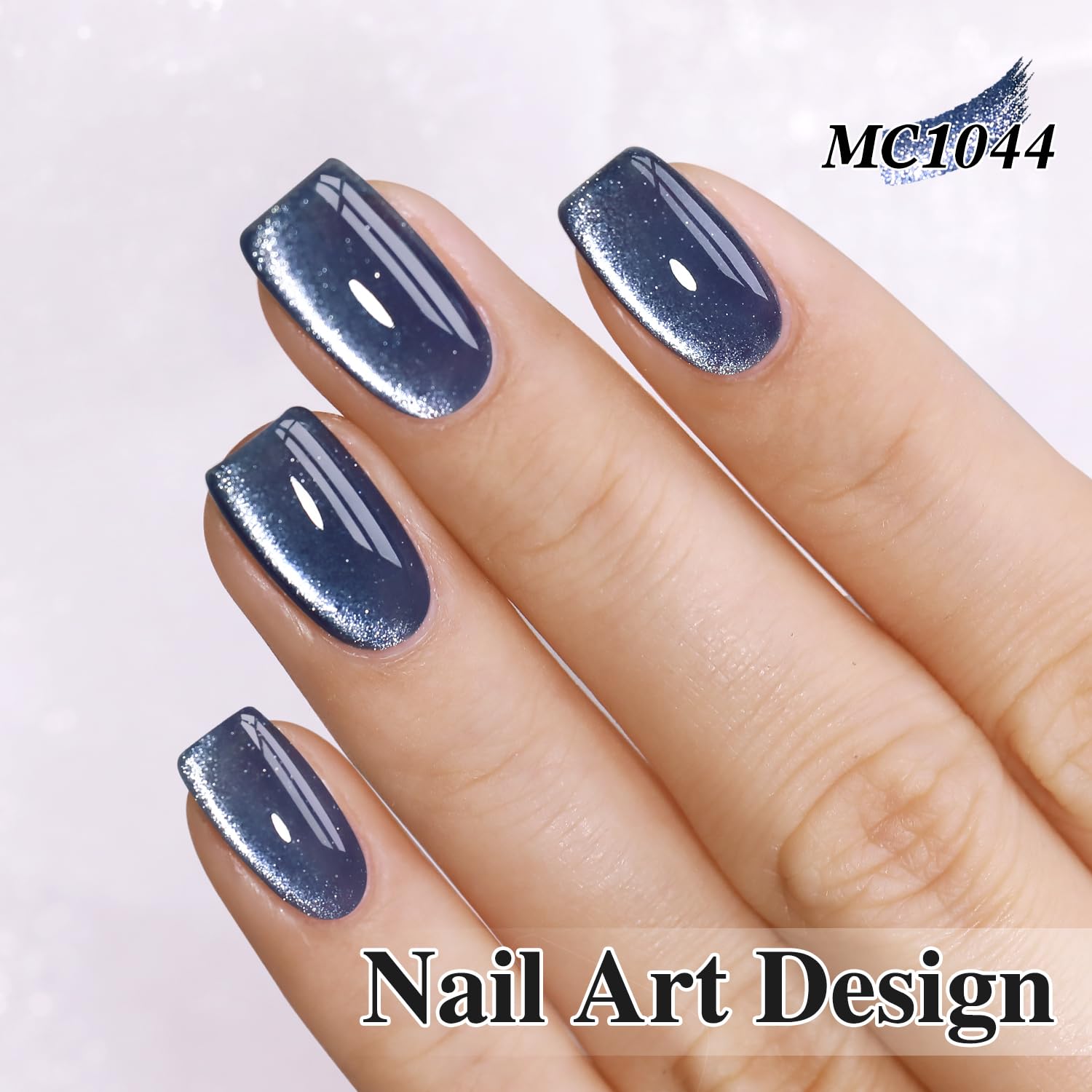Double Rhythm cat eye look achieved with magnet on nails.