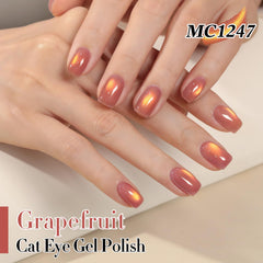 Double Rhythm cat-eye polish grape-gold reveals dynamic magnet-based shimmer on nails