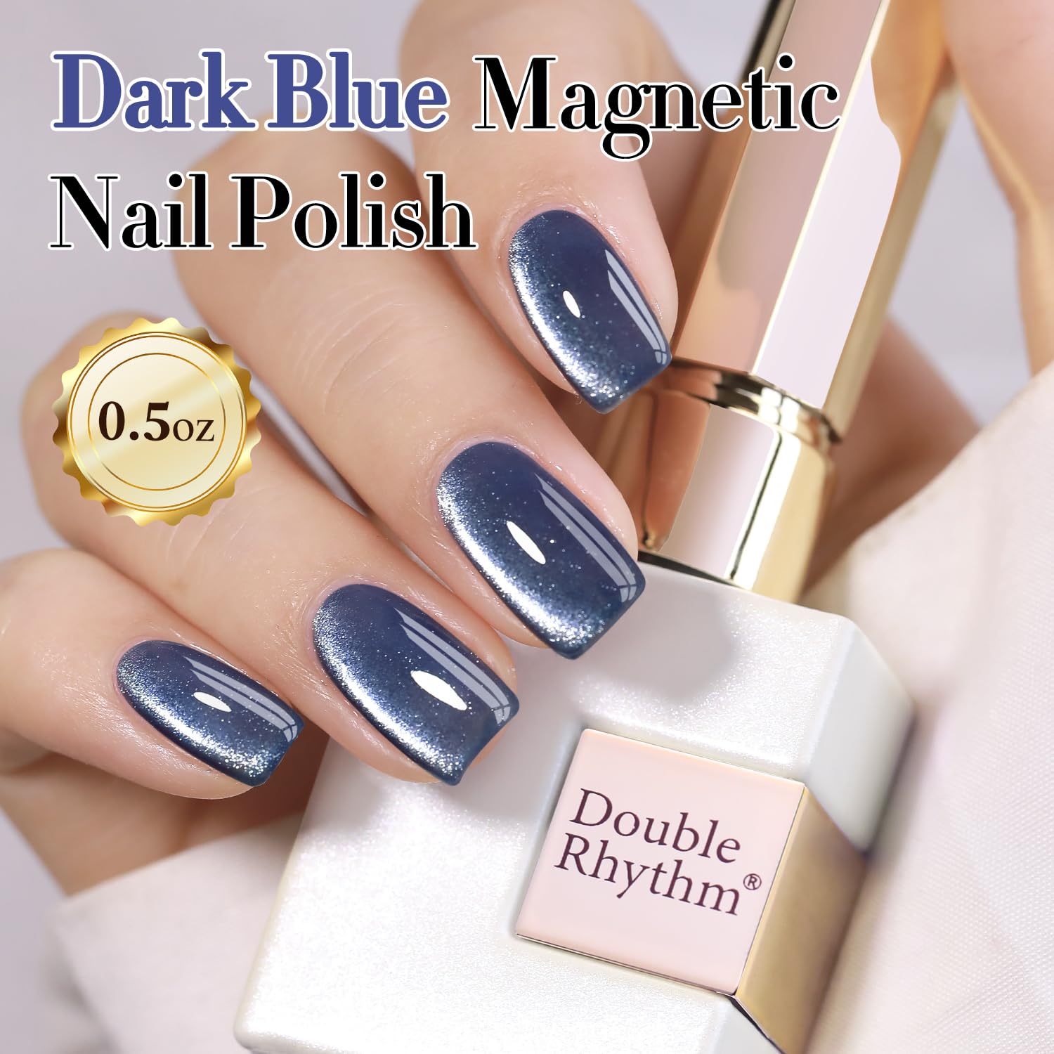 Nail swatch of Double Rhythm cat eye polish in dark blue for smooth finish.