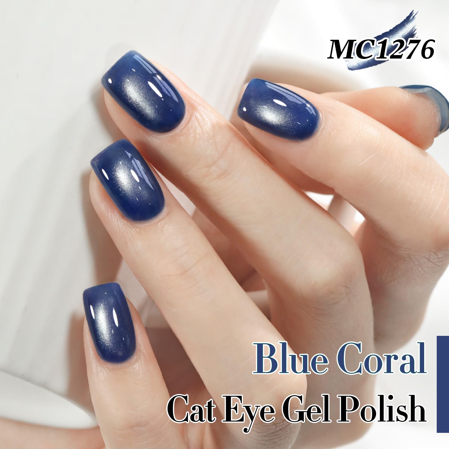 Close-up of holographic glitter in Double Rhythm Blue Coral cat eye gel