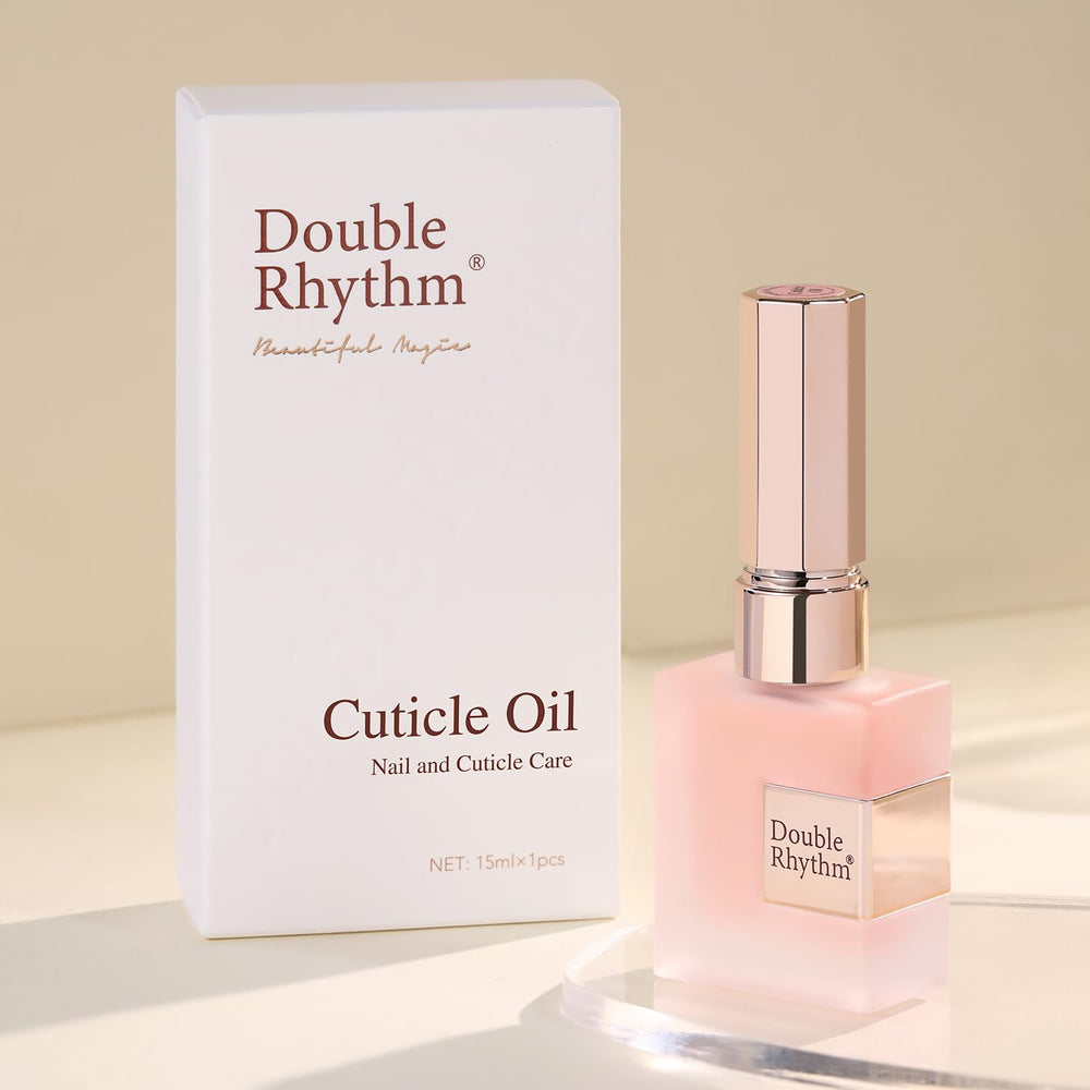 Double Rhythm Cuticle Oil bottle ready for application, nourishing nails and cuticles.