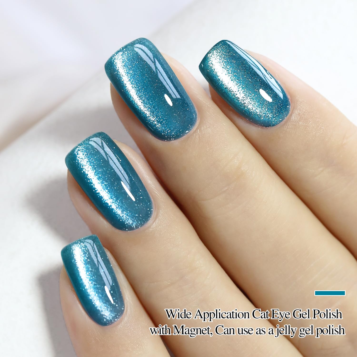 Double Rhythm home manicure scene with teal cat-eye polish and magnet tool