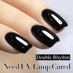 Pure sheer black gel polish on nail tip close-up by Double Rhythm.