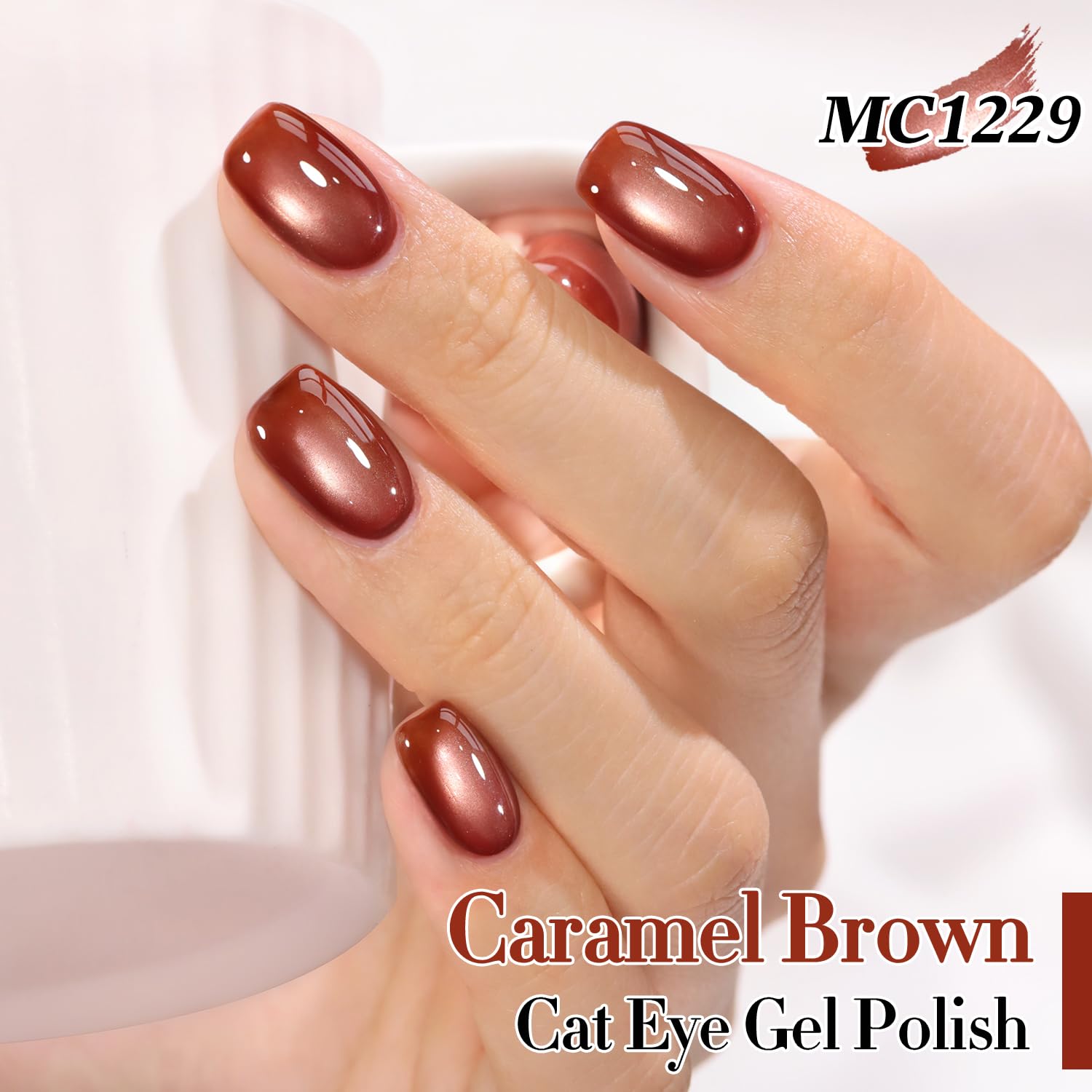 Close-up magnet shaping cat eye shimmer on Double Rhythm polish