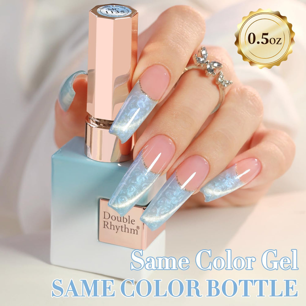 Mermaid Blue cat eye gel nail art with magnetic depth effect.