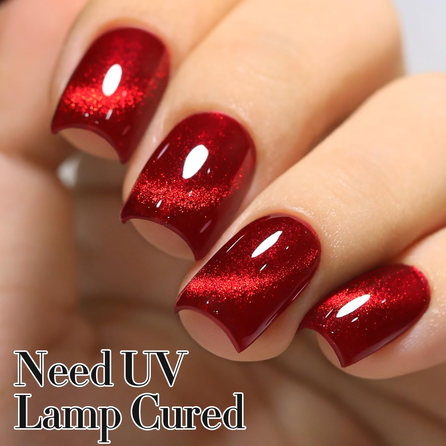 Double Rhythm nail art on fingers shows vibrant red base with glitter overlay