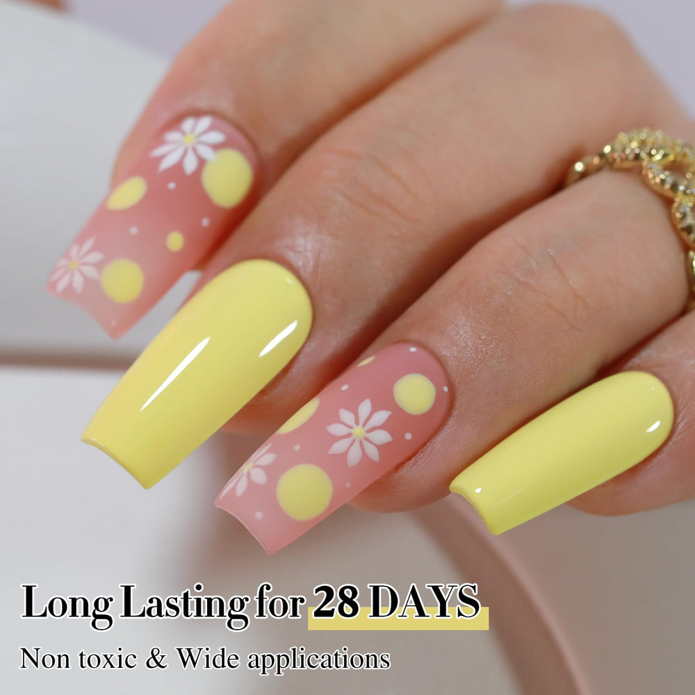 Double Rhythm nails with light yellow polish in a neat manicure